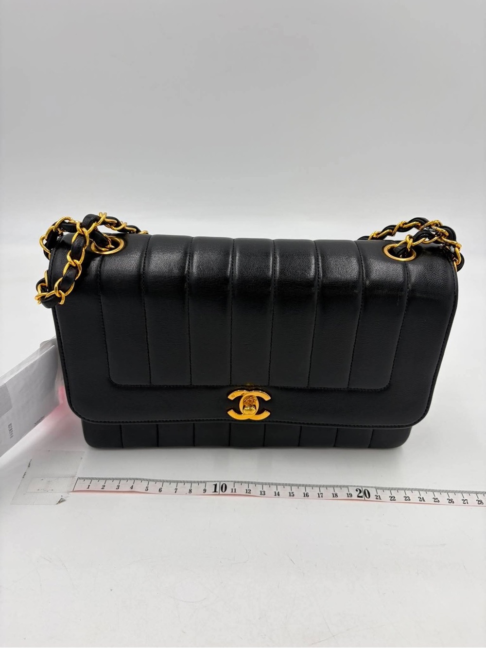 CHANEL VINTAGE Black Vertical Quilted Mademoiselle Shoulder Bag 24k-Gold-Tone